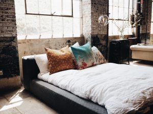 single mattress in a rustic apartment